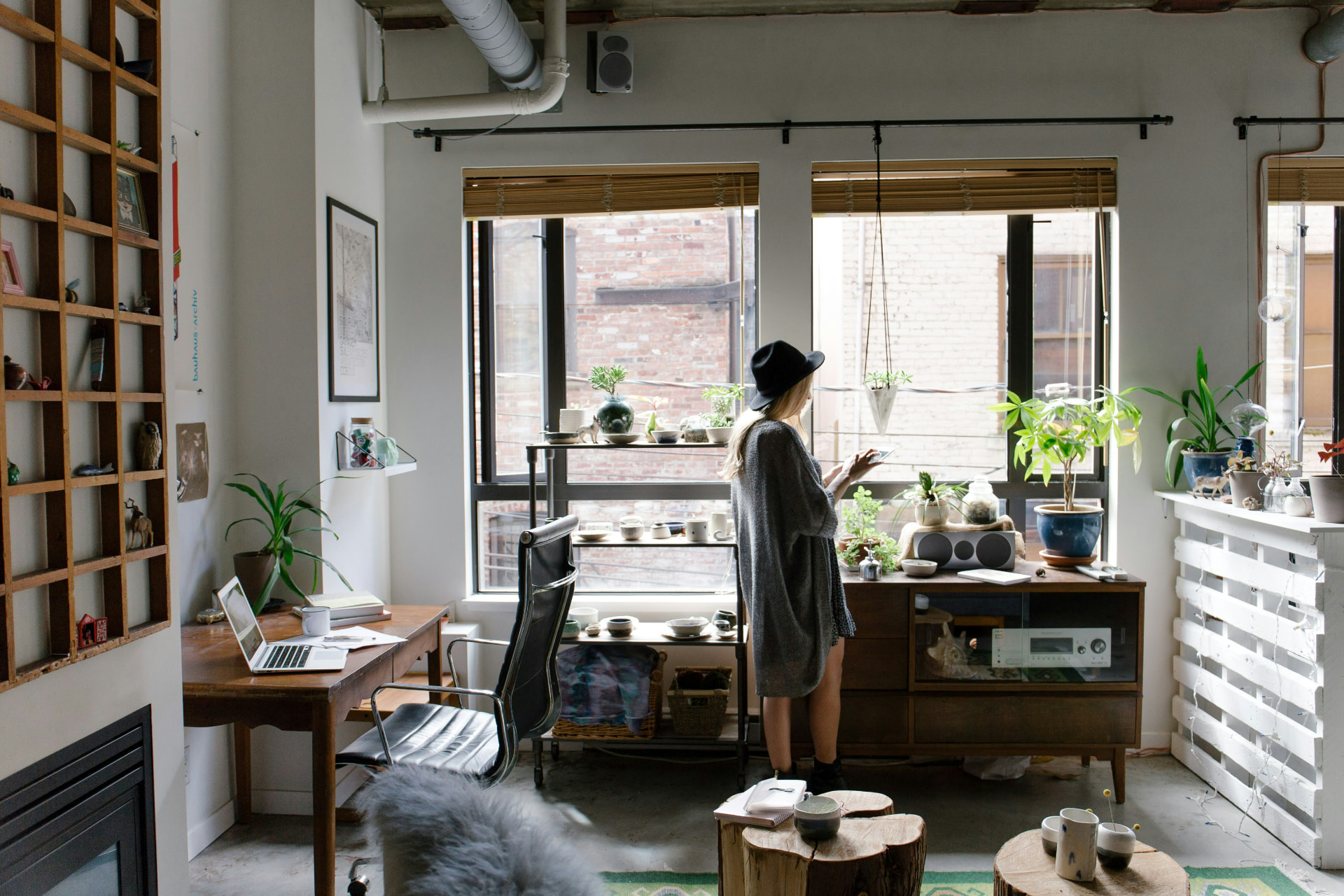 A member's plant-filled apartment with personal touches everywhere